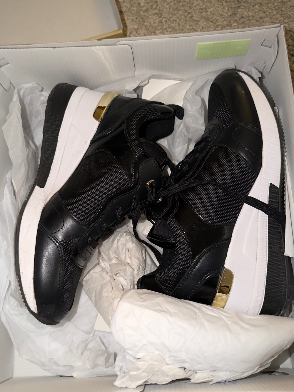 Michael Kors Black and White Women's Sneakers with Gold Accent